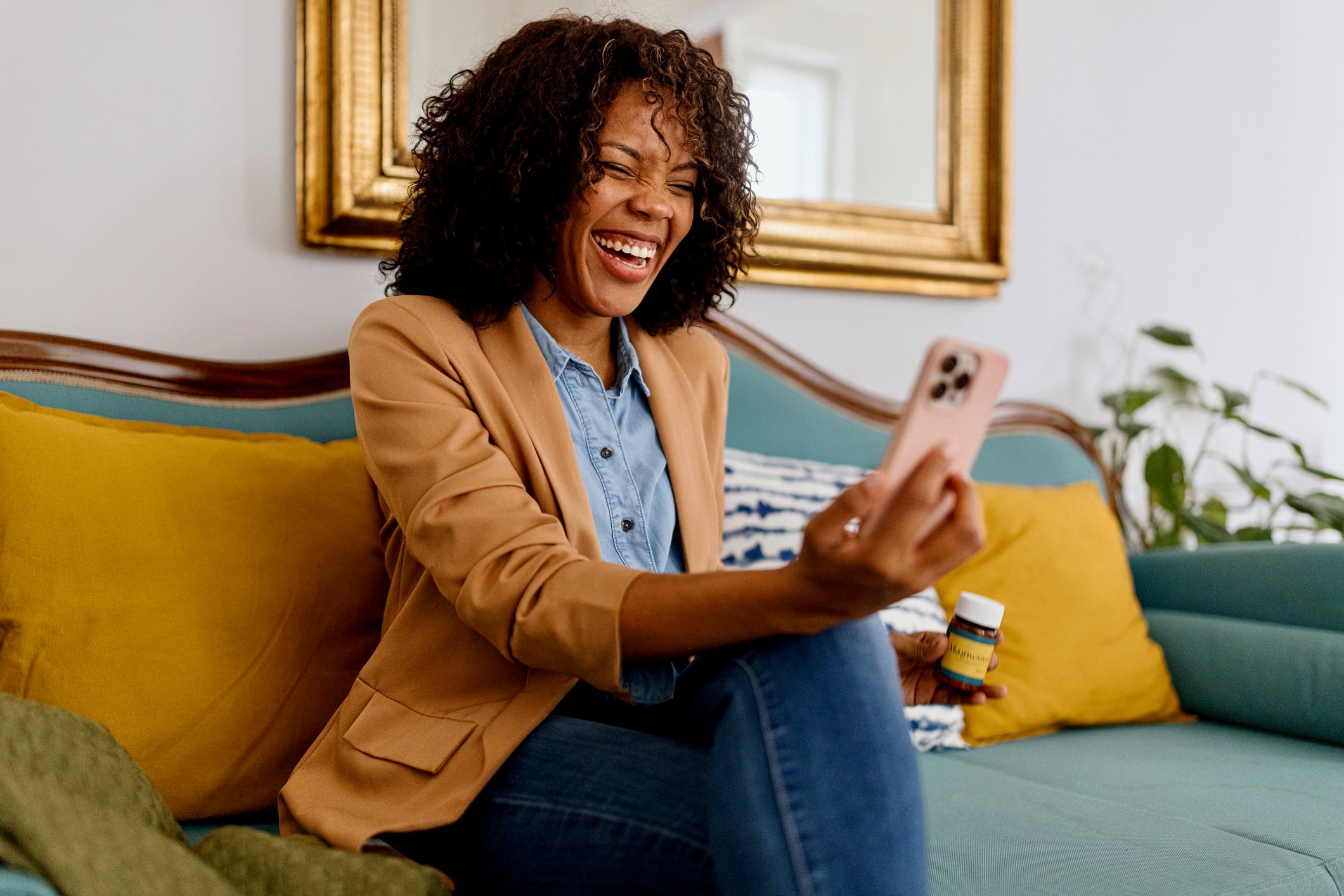 Woman smiling at phone