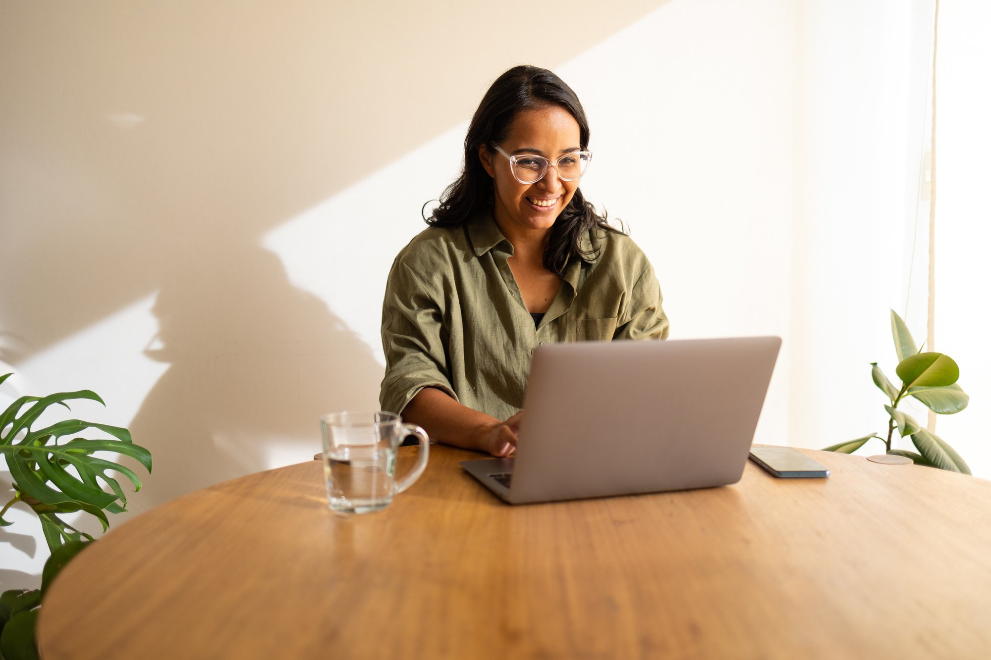 Woman smiling at computer